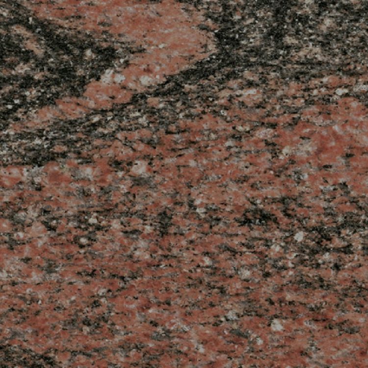 Strukturierte Oberfläche von rotem und schwarzem Granit mit feinen Kristallen.
