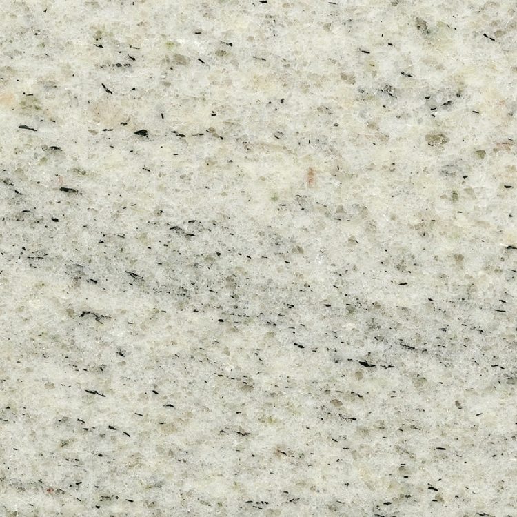 Helle, strukturiert graue Gesteinsoberfläche mit feinen schwarzen und braunen Flecken.