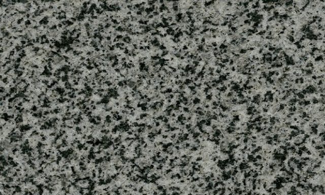 Grau marmorierter Stein mit feinen und groben Strukturen.