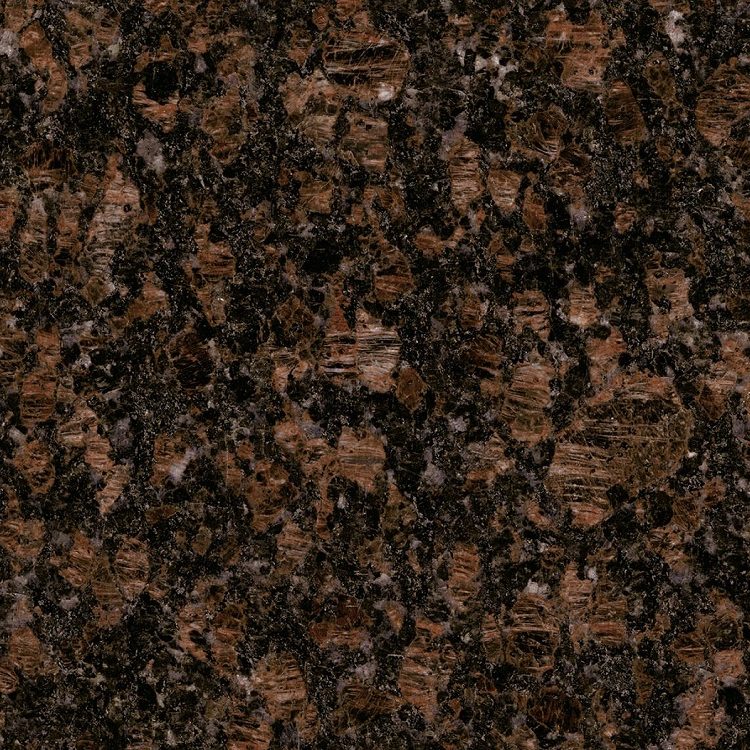 Brauner Granit mit schwarzen und rötlichen Einsprenklungen.