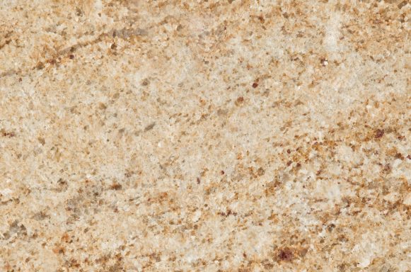 Oberfläche aus hellem, strukturiertem Stein mit gelblichen und braunen Nuancen.