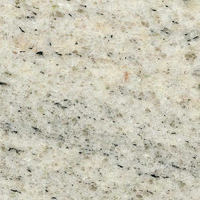 Oberfläche von hellem Granit mit feinen, dunklen und hellen Einsprengseln.