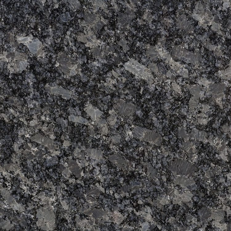 Gestreiftes Gestein mit schwarzen, grauen und orangefarbenen Mustern.